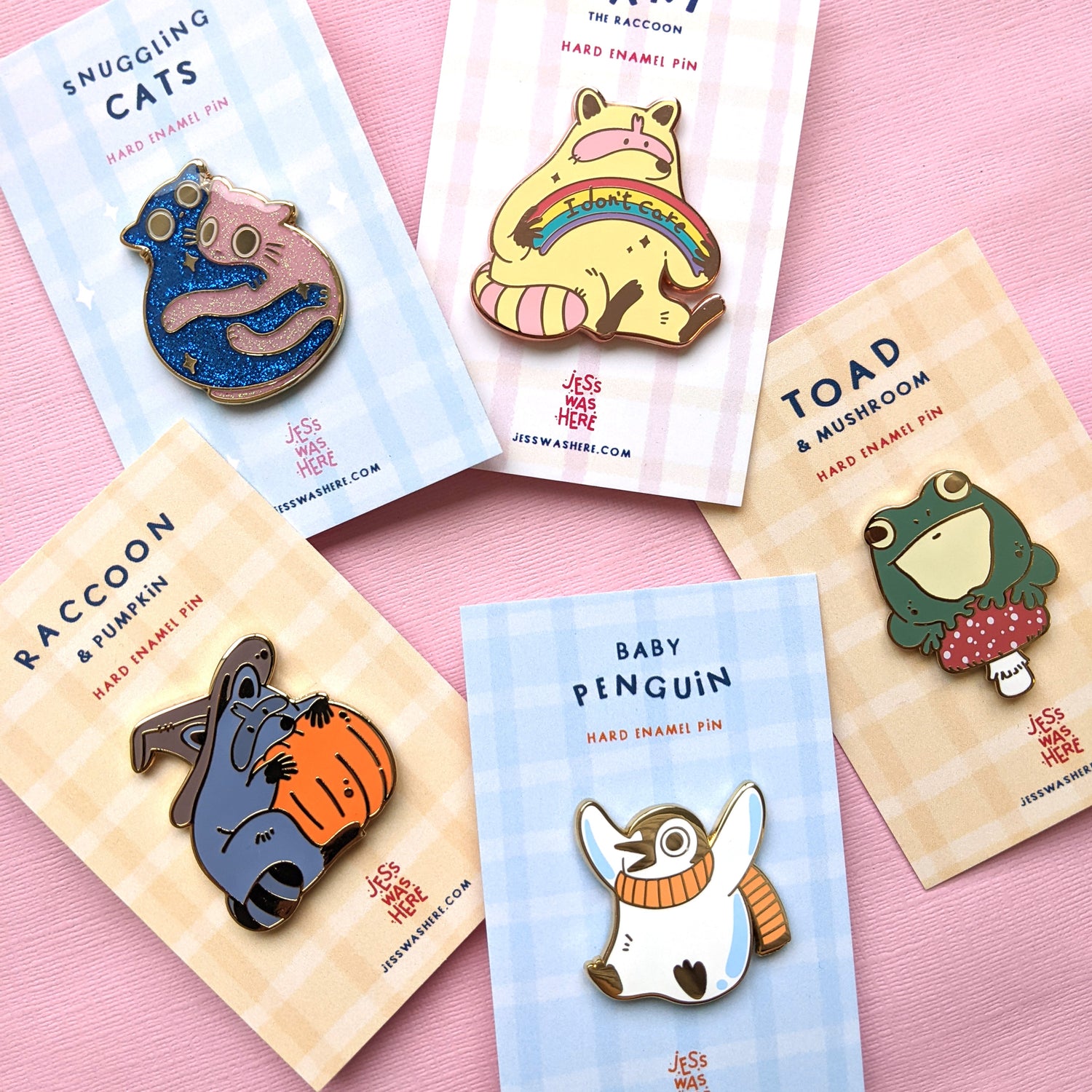 Coloruful and hard enamel pins featuring raccoons with pizza and apple.