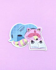 Raccoon with Book - Vinyl Sticker - Patreon - Jess Was Here